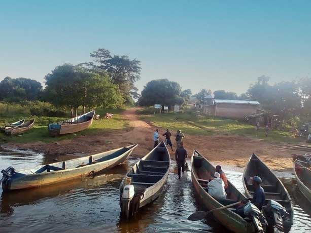 Boats docked at a river bed